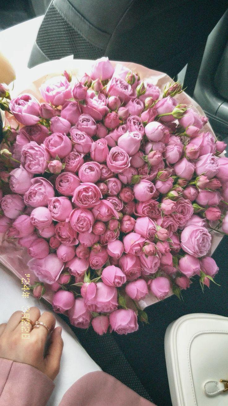 Professional floral arrangement in modern corporate setting