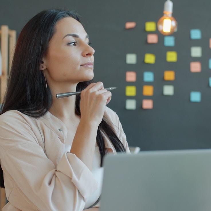 Mobile app project planning workspace with devices and development tools